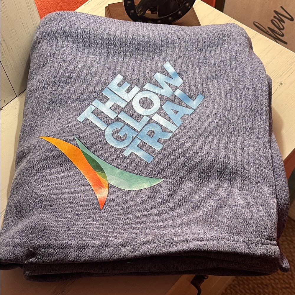 Blue/Gray Throw Blanket with The Glow Trial Logo